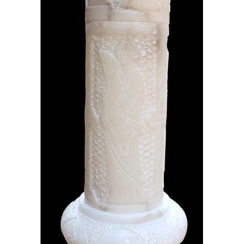 234B - (Damaged in transit) A carved alabaster urn, paired with and raised on sectional alabaster pedestal,... 