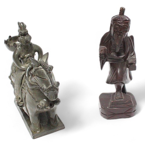 458 - Two hard stone effect resin figures of seated Buddhas, raised on pedestal bases, together with a car... 