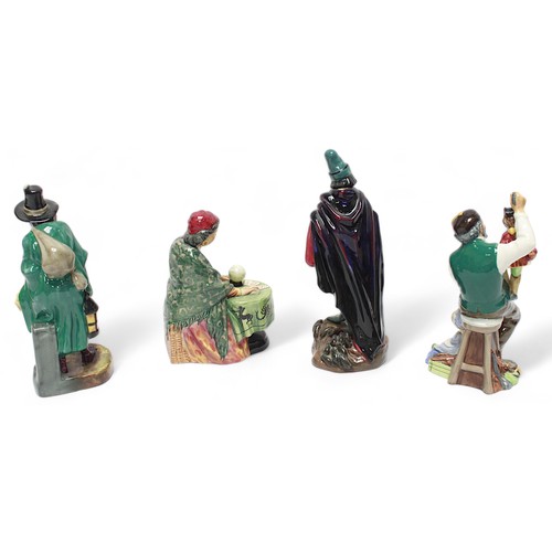 63 - Four Royal Doulton porcelain figures comprising HN2103 ‘The Mask Seller’ measuring 21cm high, HN2159... 