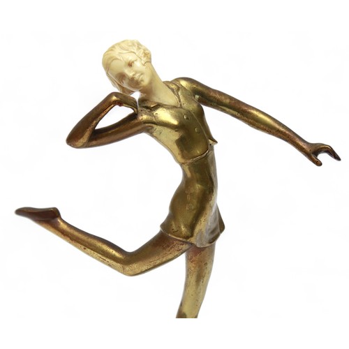 686 - Josef Lorenzl (1892-1950), an Art Deco gilt bronze and carved ivory figure, c.1920s, modelled as a d... 