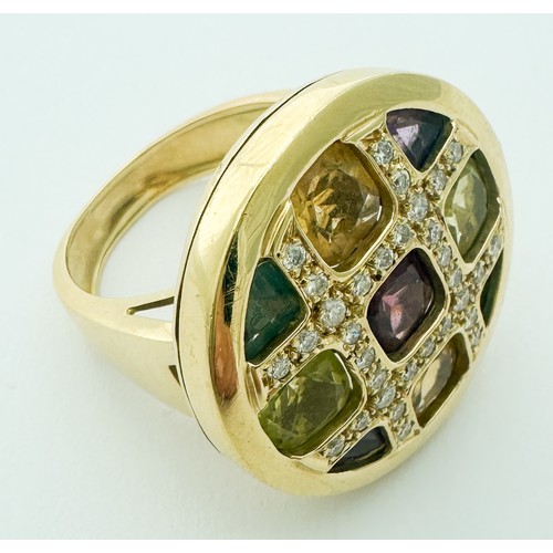 258 - An 18ct yellow gold dress ring, set with citrine, amethyst, blue topaz, peridot and almandine garnet... 