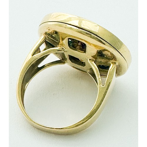 258 - An 18ct yellow gold dress ring, set with citrine, amethyst, blue topaz, peridot and almandine garnet... 