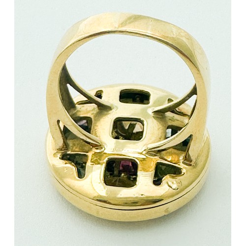 258 - An 18ct yellow gold dress ring, set with citrine, amethyst, blue topaz, peridot and almandine garnet... 