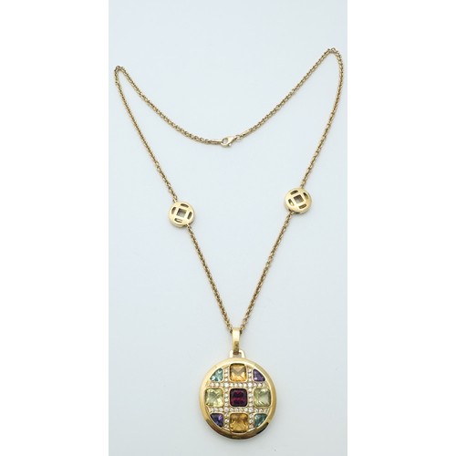 259 - An 18ct yellow gold large circular pendant, set with citrine, amethyst, blue topaz, peridot, almandi... 