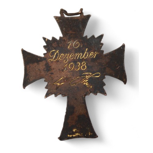 599 - A German WWII Cross of Honour of the German Mother/Mutter Cross medal, enamel and bronze 3rd class e... 