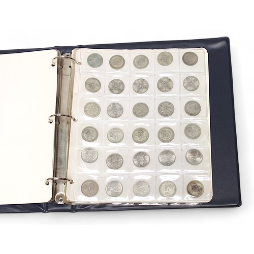 357 - An album containing a collection of Victorian to pre-decimalisation British and foreign coinage, to ... 