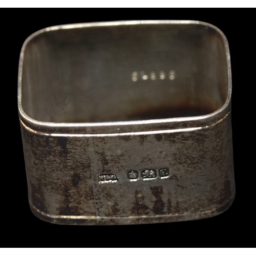 170 - A set of six late Victorian silver napkin rings of rectangular form, with vacant cartouches, Sheffie... 