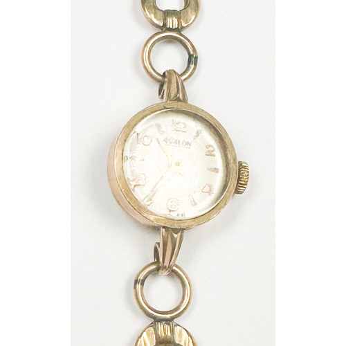 297 - A 9ct yellow gold ladies Avalon cocktail watch, with circular dial, on 9ct gold horse shoe link brac... 