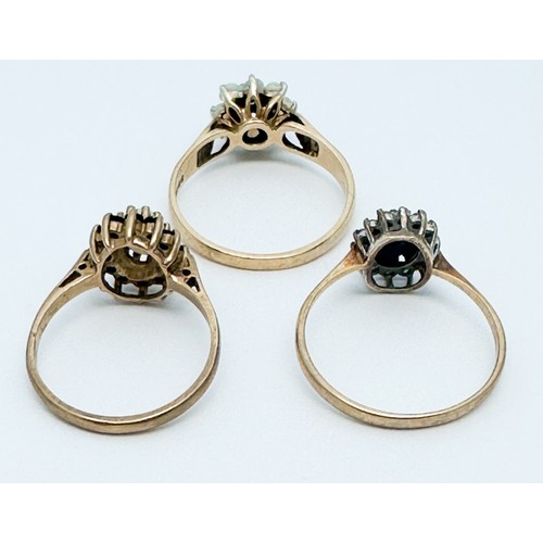 315 - Three 9ct gold cluster design rings, set with various gemstones, total weight 6.9 grams.