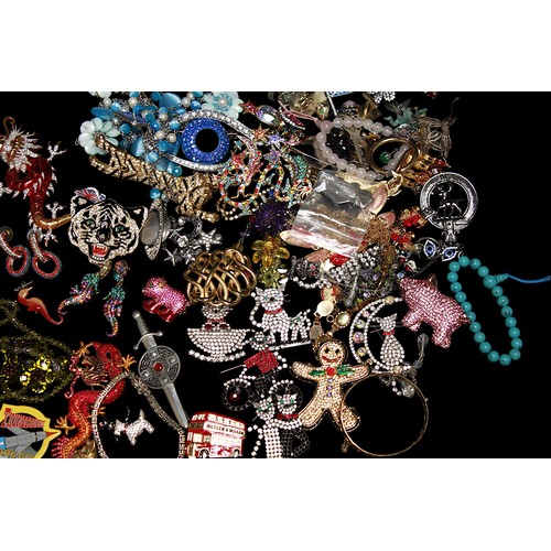 291 - A good collection of assorted costume jewellery items, predominantly branded, largely brooches by Bu... 