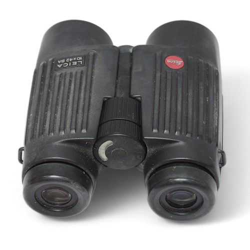 551 - A pair of Leica 10x42 BA binoculars, hard rubber barrels and object lens eyepieces, with object lens... 