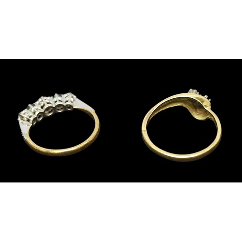 323 - Two 18ct gold rings, one set with a claw set diamond and a sapphire coloured stone, the other with p... 