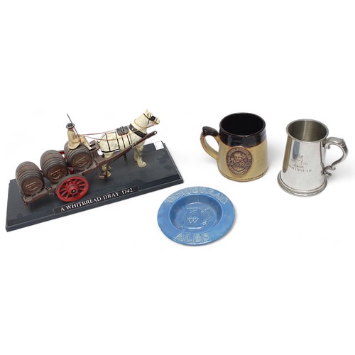 80 - Two various Whitbread pottery tankards and an ashtray, together with a display model of a Horse-draw... 