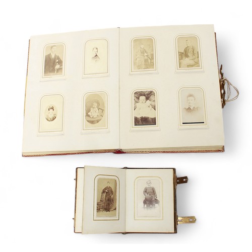 497 - Four Victorian leather bound photograph albums, gilt-edged pages and chromolitho leaves, including a... 