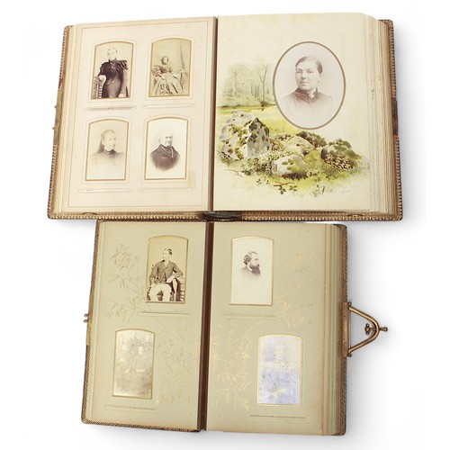 497 - Four Victorian leather bound photograph albums, gilt-edged pages and chromolitho leaves, including a... 