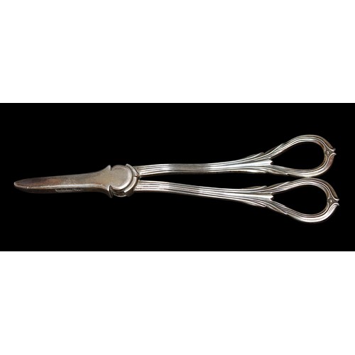 178 - A pair of silver grape scissors by Barker Brothers, Chester, 1912, with foliate cast decoration to t... 