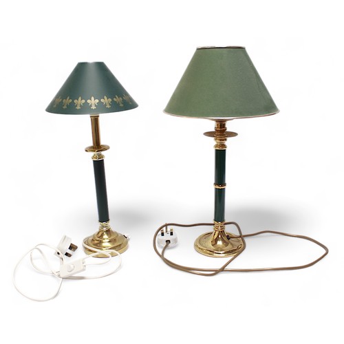 573 - A pair of brass table lamps modelled as Clasical columns with composite capitals, and two smaller br... 