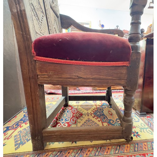 738 - An early 17th century oak Wainscott chair, the back with carved strapwork to top and middle rails, h... 