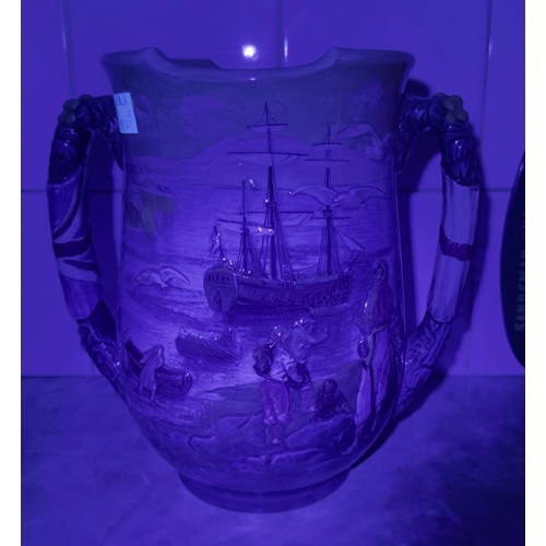 22 - A Royal Doulton loving cup, ‘Captain Cook The Greatest Navigator’, limited 89/350, 25cm high.