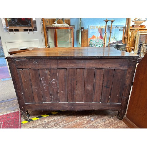 717 - An 18th Century mahogany commode chest of serpentine outline, with foliate gilt bronze mounts and es... 