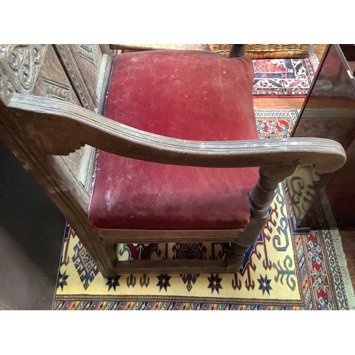 738 - An early 17th century oak Wainscott chair, the back with carved strapwork to top and middle rails, h... 