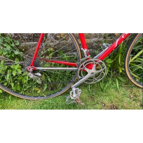 230 - A Colnago road bike in Candy red, 6 speed Campagnolo gears, Delta Brakes and Turbo saddle, with Coln... 