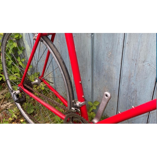 241 - A Reynolds road bike in Candy red (531 Tubing), 7 speed Ex Age 300EX gears and Ex Age Brakes, with A... 