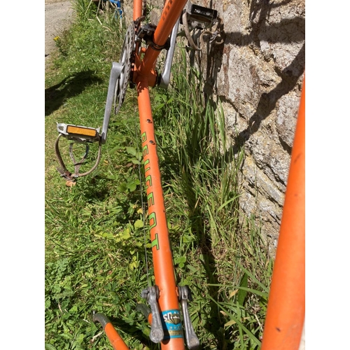 243 - A Peugeot (Recorde du monde) road bike frame in Tangerine, with  7 speed gears and French Brakes, At... 