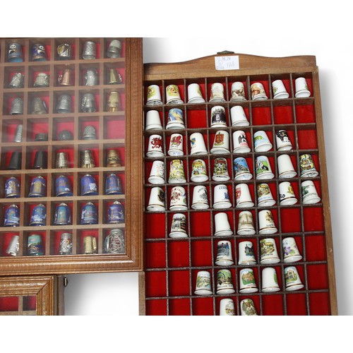 284 - A large collection of approximately four-hundred and forty assorted thimbles, to include a bronze be... 