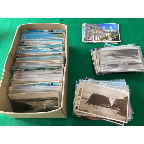 550 - A box of postcards of Cornwall, including the old standard-size and some moderns (mostly standard si... 