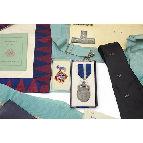 279 - A collection of assorted Freemasonry regalia including sash’s, gloves, ties, jewels and by-law bookl... 