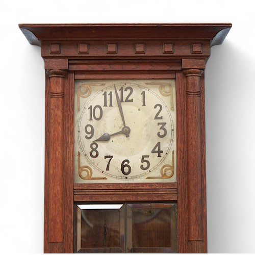 106 - An early 20th century, Art Deco style oak wall clock by Sopra, the moulded cornice above a silvered ... 