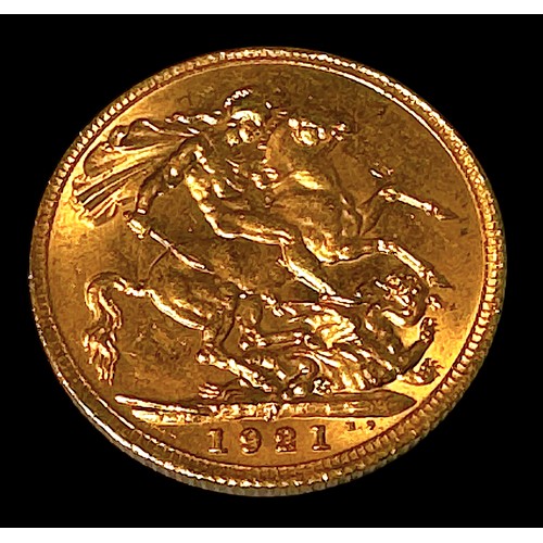 630 - A George V Gold Sovereign, 1921, Perth Mint Mark, about EF.