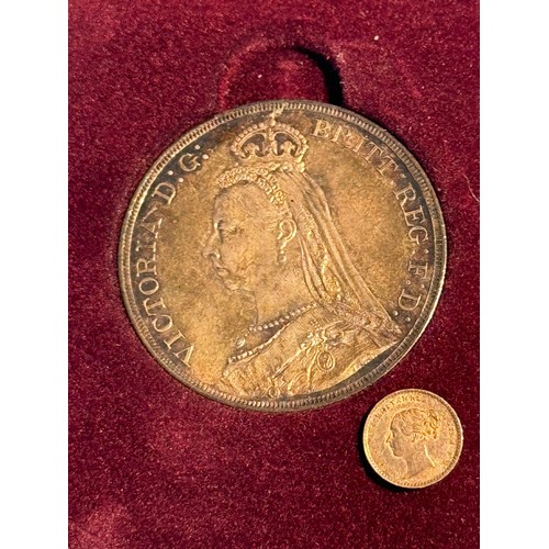 633 - A Queen Victoria Silver Jubilee Crown 1887, EF with toning, in fitted box together with a QV Silver ... 