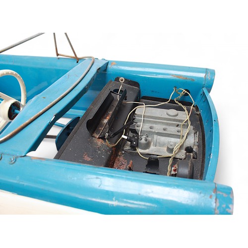 401 - A Tri-ang pedal car, C.1960’s, finished in blue and white, with applied metal branded badge to boot ... 