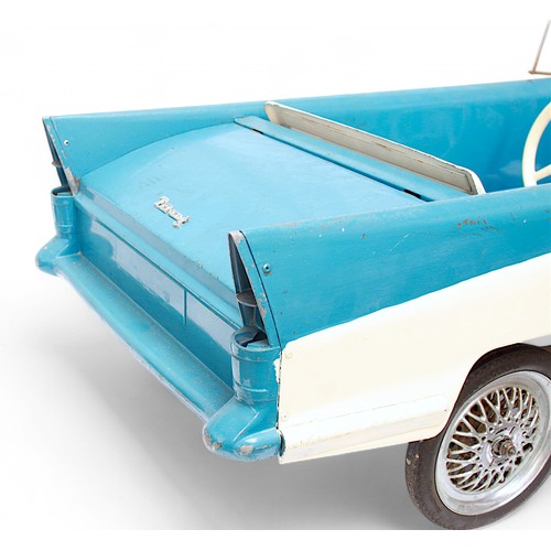 401 - A Tri-ang pedal car, C.1960’s, finished in blue and white, with applied metal branded badge to boot ... 