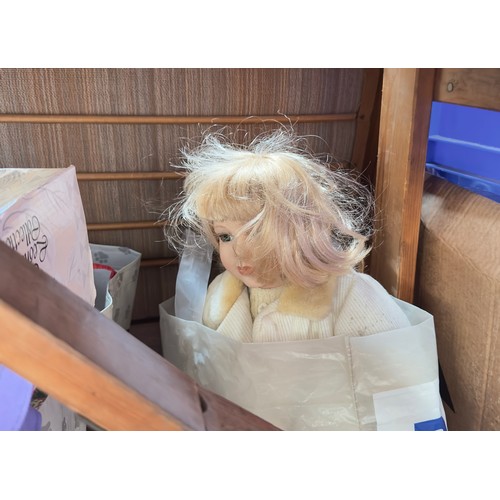 410 - A collection of approximately twenty vintage dolls, predominantly boxed porcelain dolls, comprising ... 