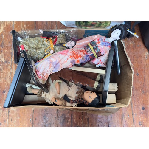 410 - A collection of approximately twenty vintage dolls, predominantly boxed porcelain dolls, comprising ... 