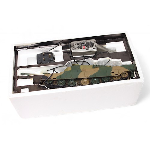 416 - A boxed 1:24 scale RC Battle Tank Type 90, with automatic electric gun and documents, lacking ammuni... 