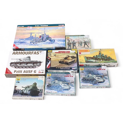 435 - A collection of twenty-four various unassembled plastic military scale model build kits, to include ... 