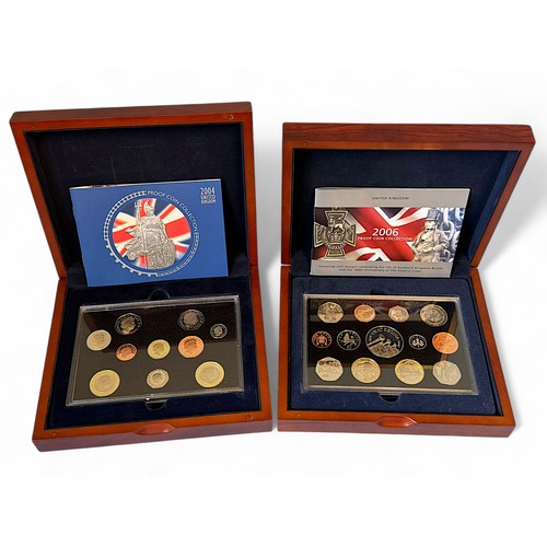 663 - Two Royal Mint Executive Proof Coin Collections, 2004 (10 coins) and 2006 (13 coins), in fitted wood... 