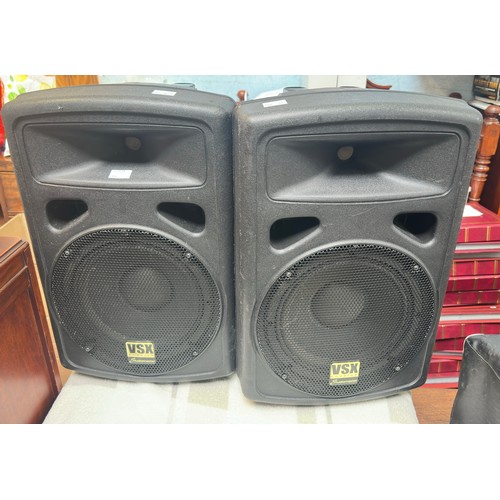 314 - A pair of Studiomaster VSX10 200W 10” passive speakers, raised on adjustable stands, together with a... 