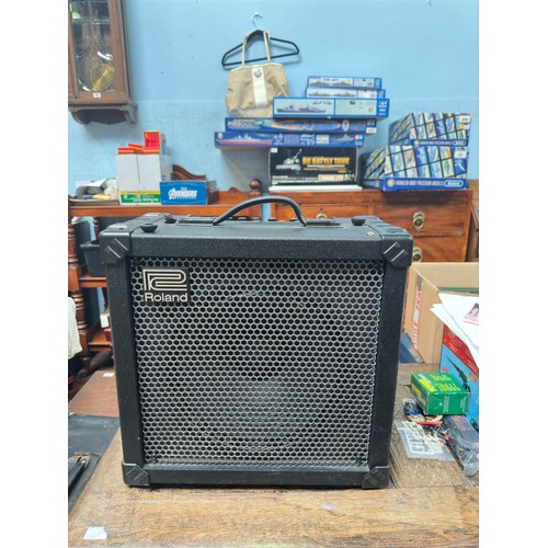 315 - Two single speaker combo amplifiers, including Roland Cube-80x guitar amplifier, 80-Watt with 1x12” ... 