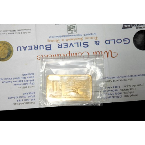 880 - A .9999 grade, one Troy ounce gold ingot, inscribed ‘Land of the Free, Home of the Brave’, commemora... 