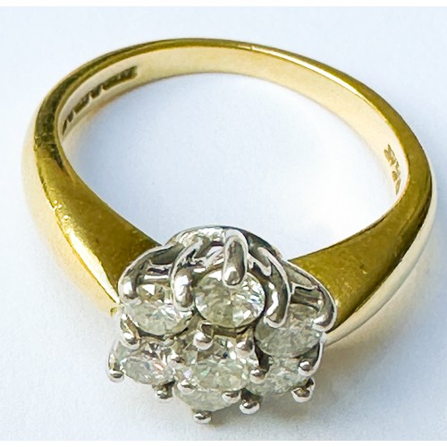 55 - An 18ct yellow gold daisy cluster diamond ring, claw set with 7 x round brilliant cut diamonds, tota... 