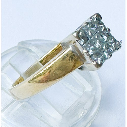 56 - An 18ct yellow gold ring, invisible set with 9 x princess cut diamonds, total diamond weight 0.50cts... 