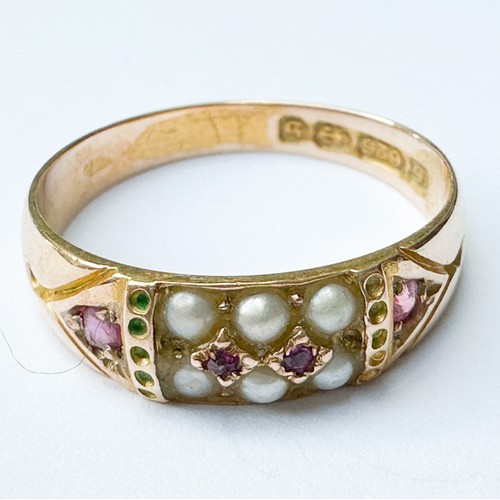 69 - A 15ct yellow gold dress ring, set with seed pearls and rubies, weighs 2.3 grams, hallmarked 1892.