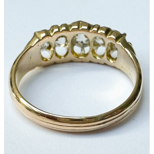 70 - An 18ct yellow gold dress ring, set with five Victorian cut diamonds in a gypsy-style setting, estim... 