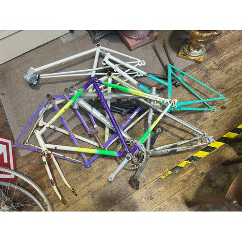 249 - A collection of 6 bike frames, various examples including MBK racing and Raleigh (in need of -re-chr... 