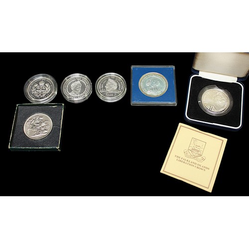 830 - A Falkland Islands Liberation Silver Crown, Ten Dollars Royal Visit Tuvalu Silver Coin, both with ce... 